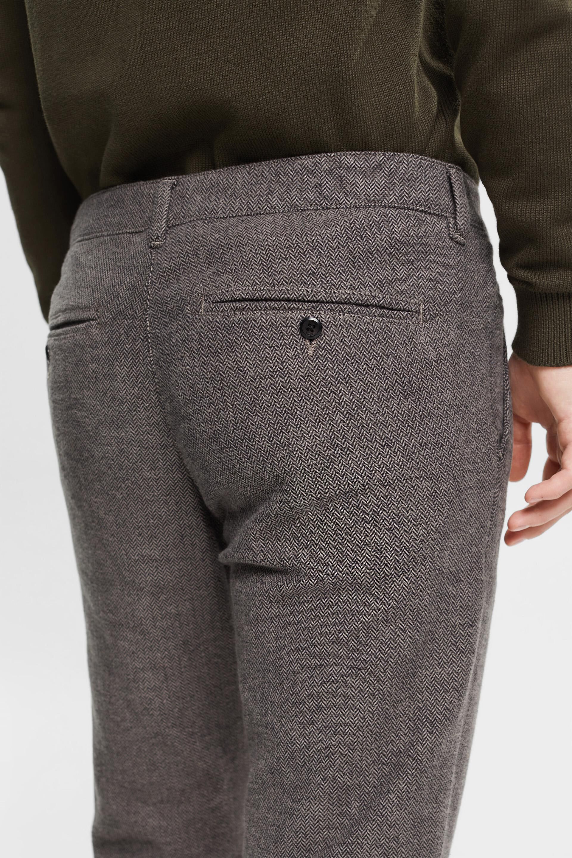 Grey Pinstriped wool-herringbone suit trousers | Alexander McQueen |  MATCHES UK